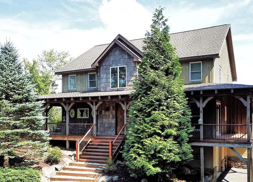 home for sale boone nc with nice landscaping around front porch