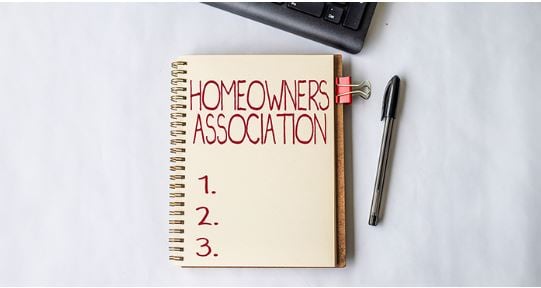 homeowner association diary with pen