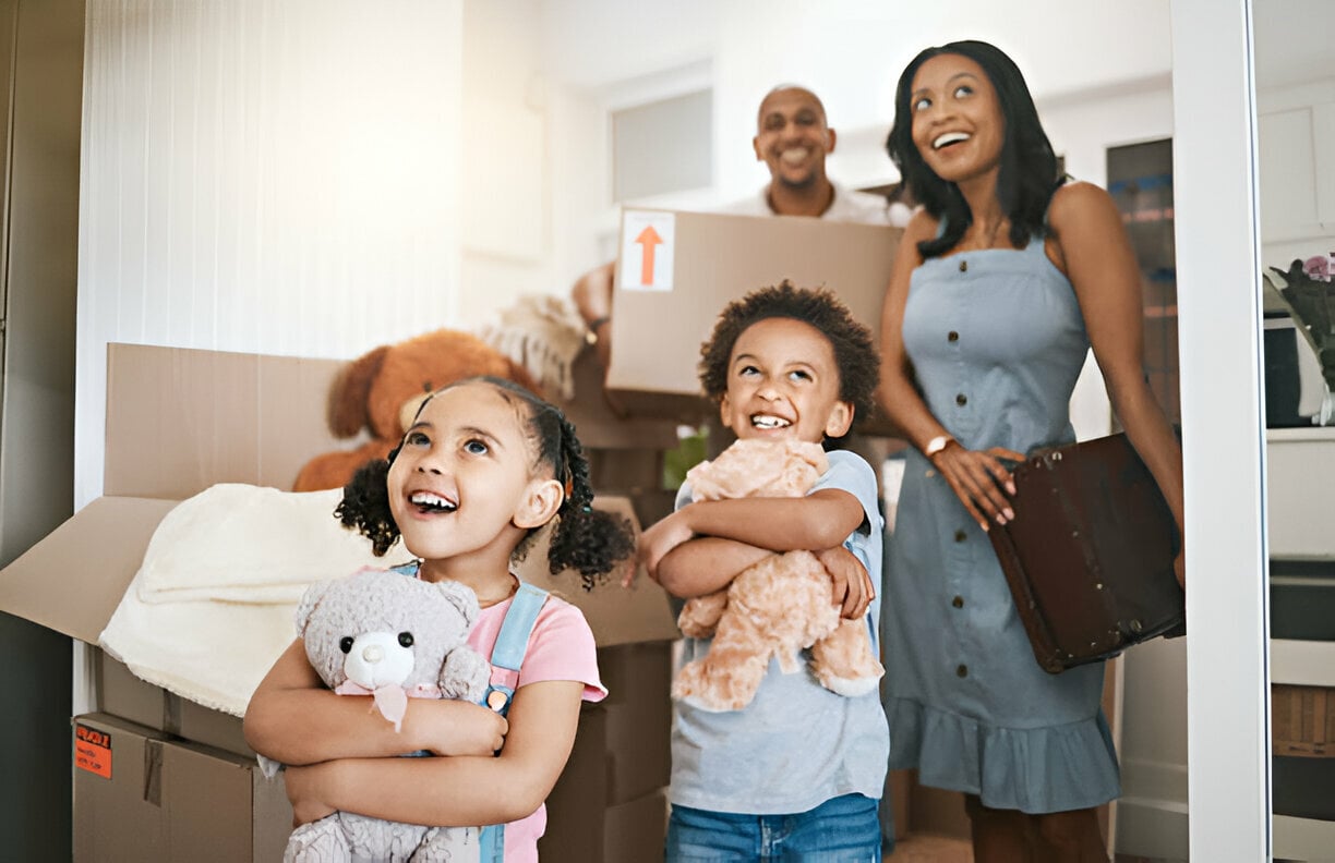 Happy family smiling and enjoying time together inside their home