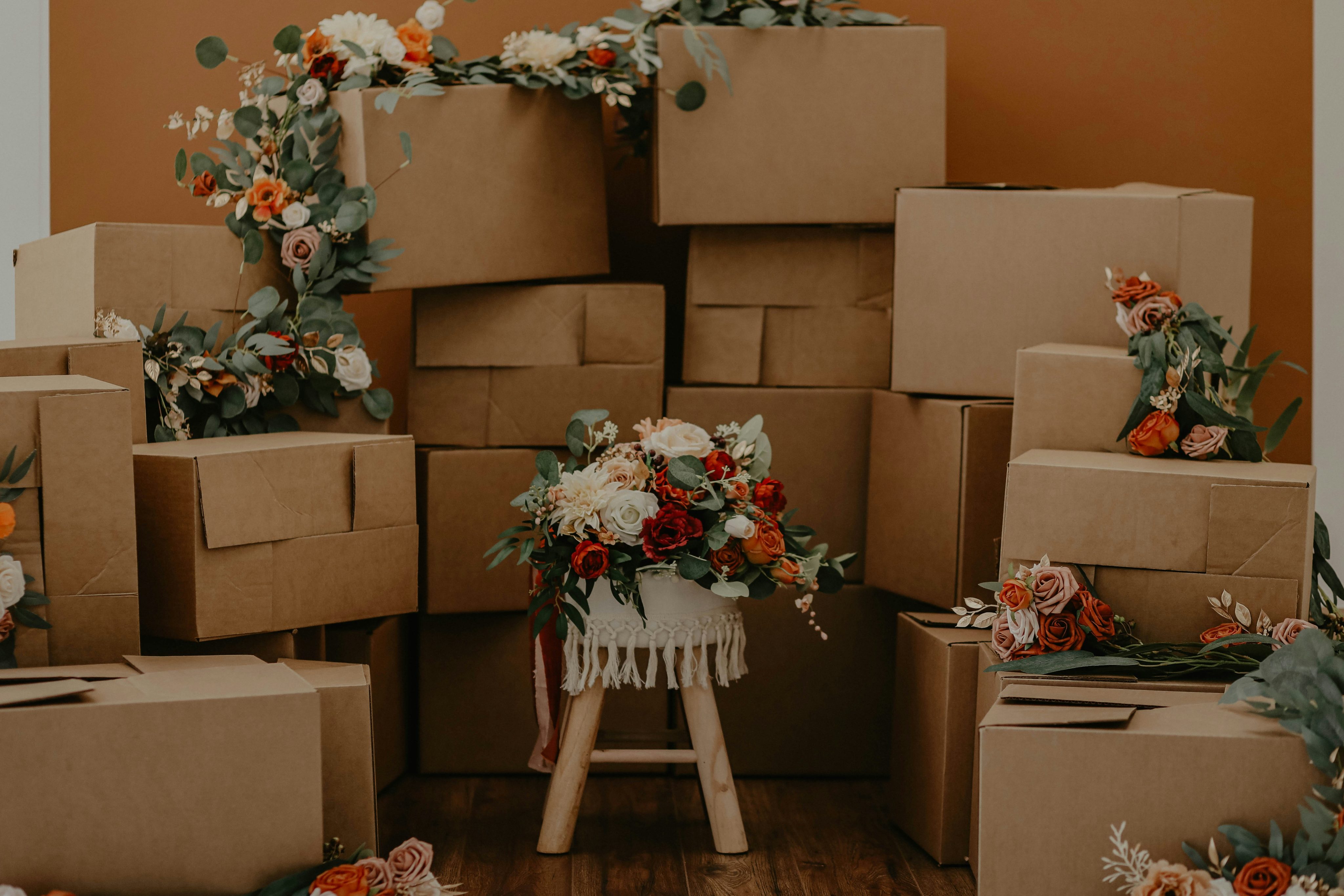 Lots of boxes for moving with flowers