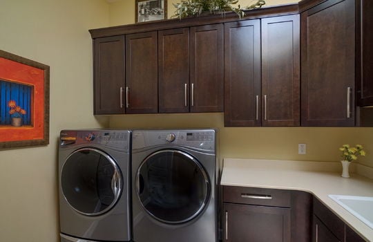 laundry-room-with-sink-and-storage