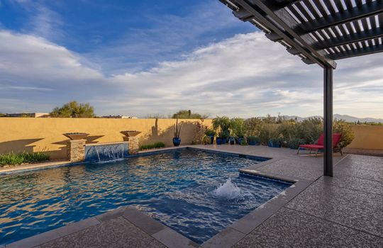 Pool With Water Feature, Tanning Deck Fountain and Fire Display