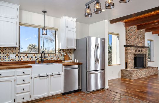 Charming Kitchen With Hexagon Saltillo Tile