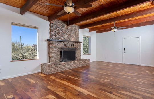 Living Space With Fireplace and Desert Vistas