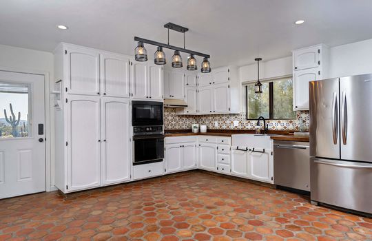 New Lighting ,Talavera Tile Backsplash, Farmhouse Sink