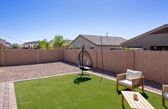Paved In Faux Grass Pad