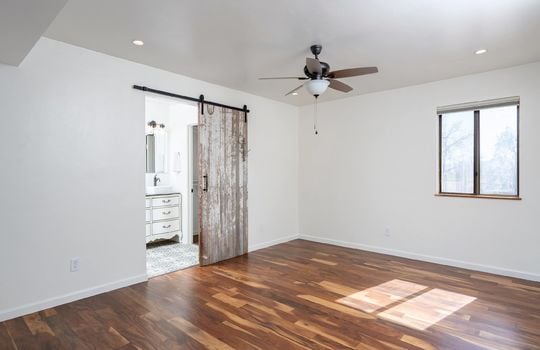 Primary Bedroom With Ensuite Bath and Walk-In Closet