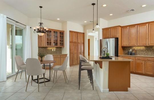 Open Kitchen With Casual Dining Area and Breakfast Bar- Digitally Staged