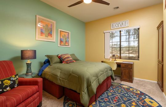 Cheerful first guest bedroom has a sofa bed for flexible usability