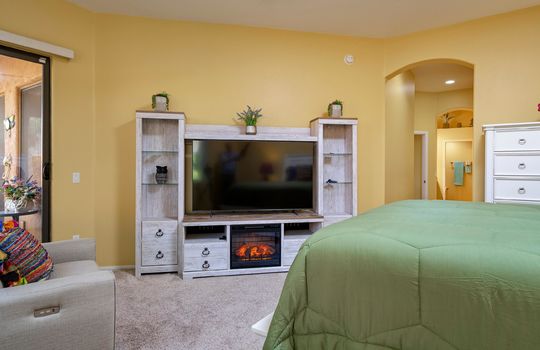 Full suite of bedroom furniture includes enetertainment unit with electric fireplace