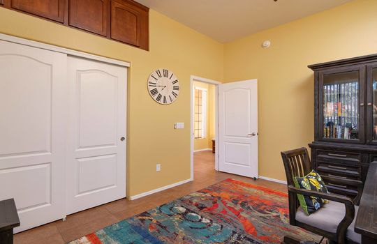 Second guest bedroom also has built-in cabinetry and full suite of office furniture