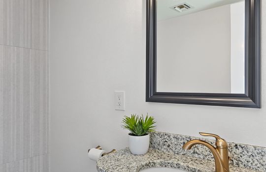 Half Bath Off Entry With Tile Feature Wall