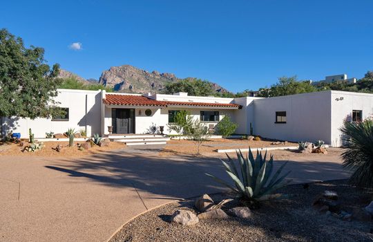 Large Winding Driveway Extends to Side of Home