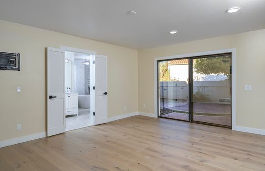 Primary Bedroom Suite With Access To Patio