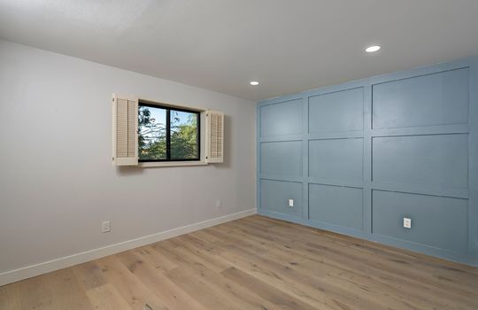 Second Guest Bedroom Offers Two Closets & a Square Panel Feature Wall