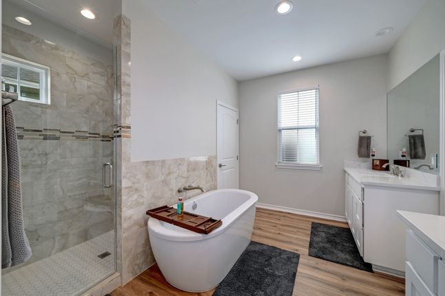 Luxurious Master Bathroom with Frameless Shower