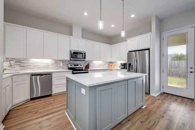 Open-Concept Kitchen with Granite Countertops