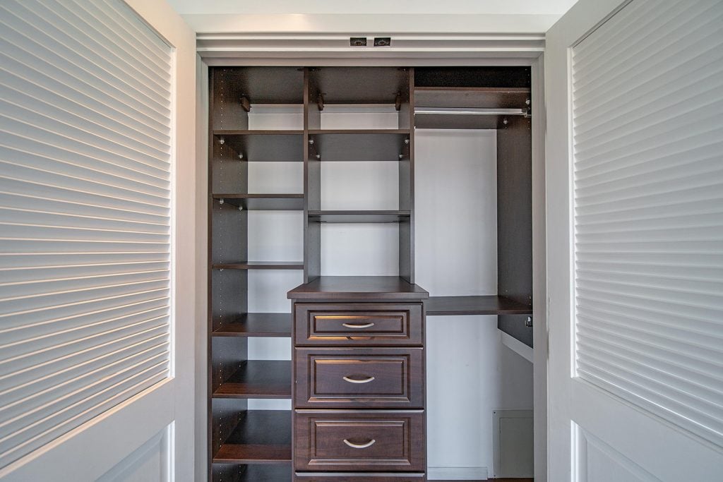 Built in Shelving in Closet with Drawers 