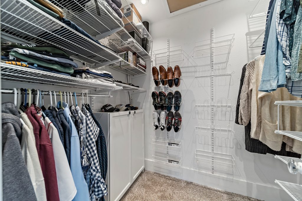 Organized Men's Closet with Build in Shoe Rack