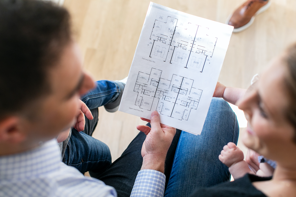 Family looking at Floorplan web