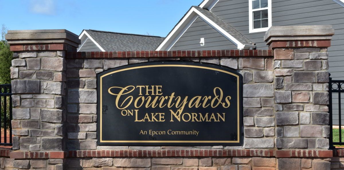 The entrance sign at The Courtyards On Lake Norman