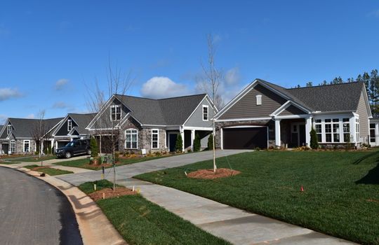View from the street of finished homes in the Courtyards On Lake Norman