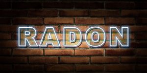 Neon Radon sign with brick wall background