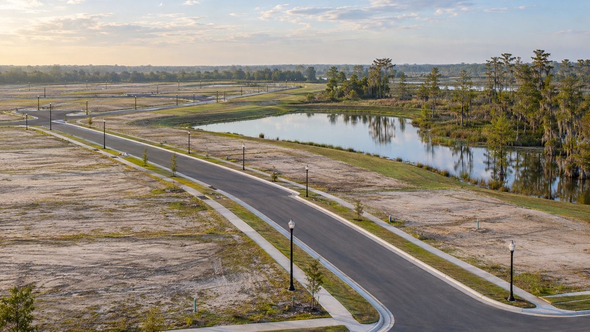 AI-generated illustration of a new Central Florida neighborhood under development beside a pond and cypress wetlands