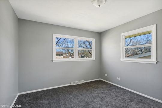 HD_1681399489457_10_18864GreenbayAve_153_2ndBedroom_MRED_2000x1333