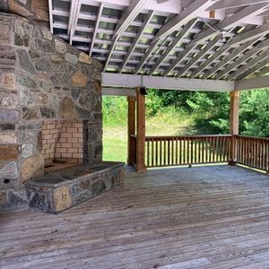 Outdoor living area in Valle Crucis home on Crab Orchard Creek.