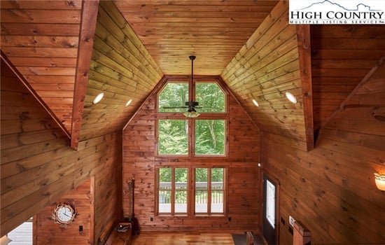 Grand foyer with high ceilings in Wren Cove log cabin house