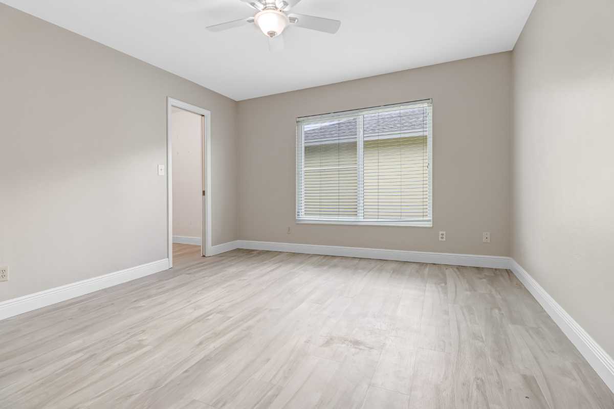 Forest Lakes guest bedroom with luxury vinyl plank flooring