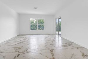 Master bedroom opens to the lanai