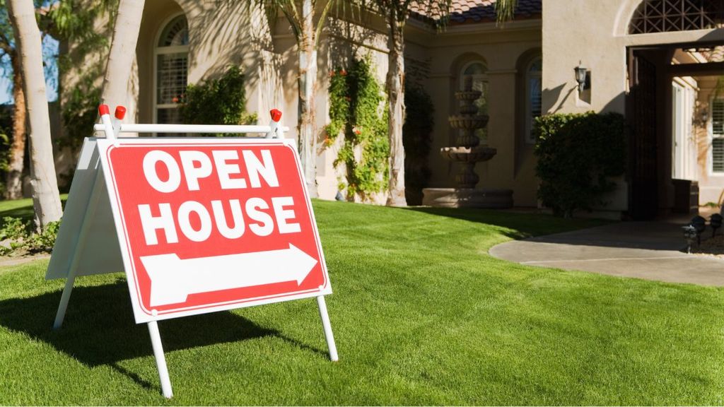 Open House sign in front of a local home