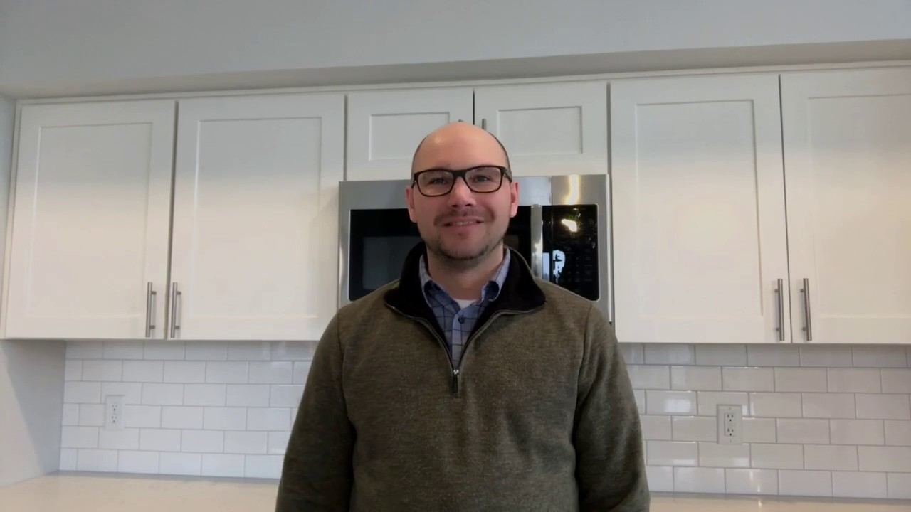 Brandon Ball of Dwelling Realty explaining how to price a home to sell in Manistee