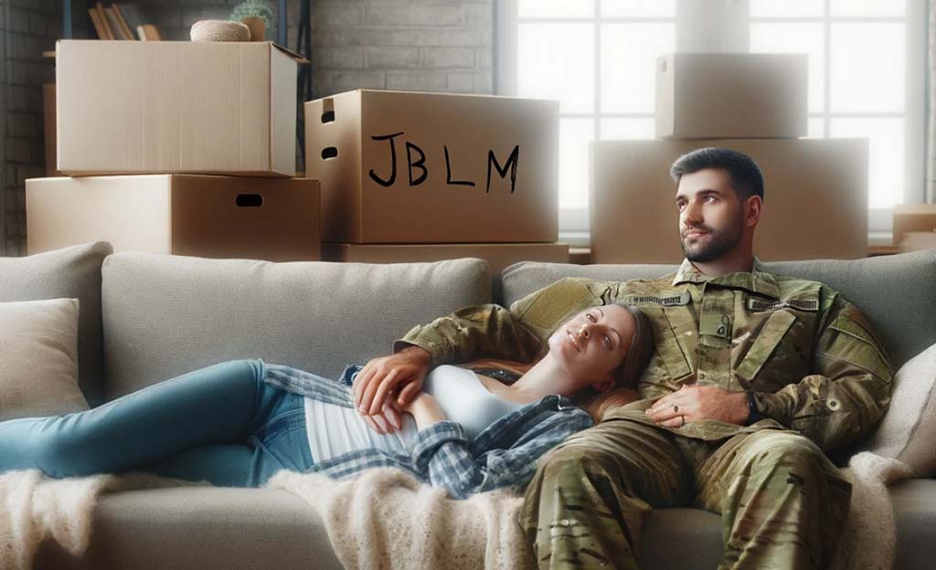Military couple with moving boxes