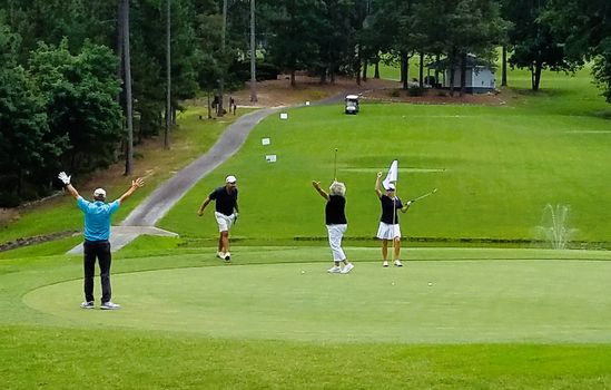 Couples-playing-golf