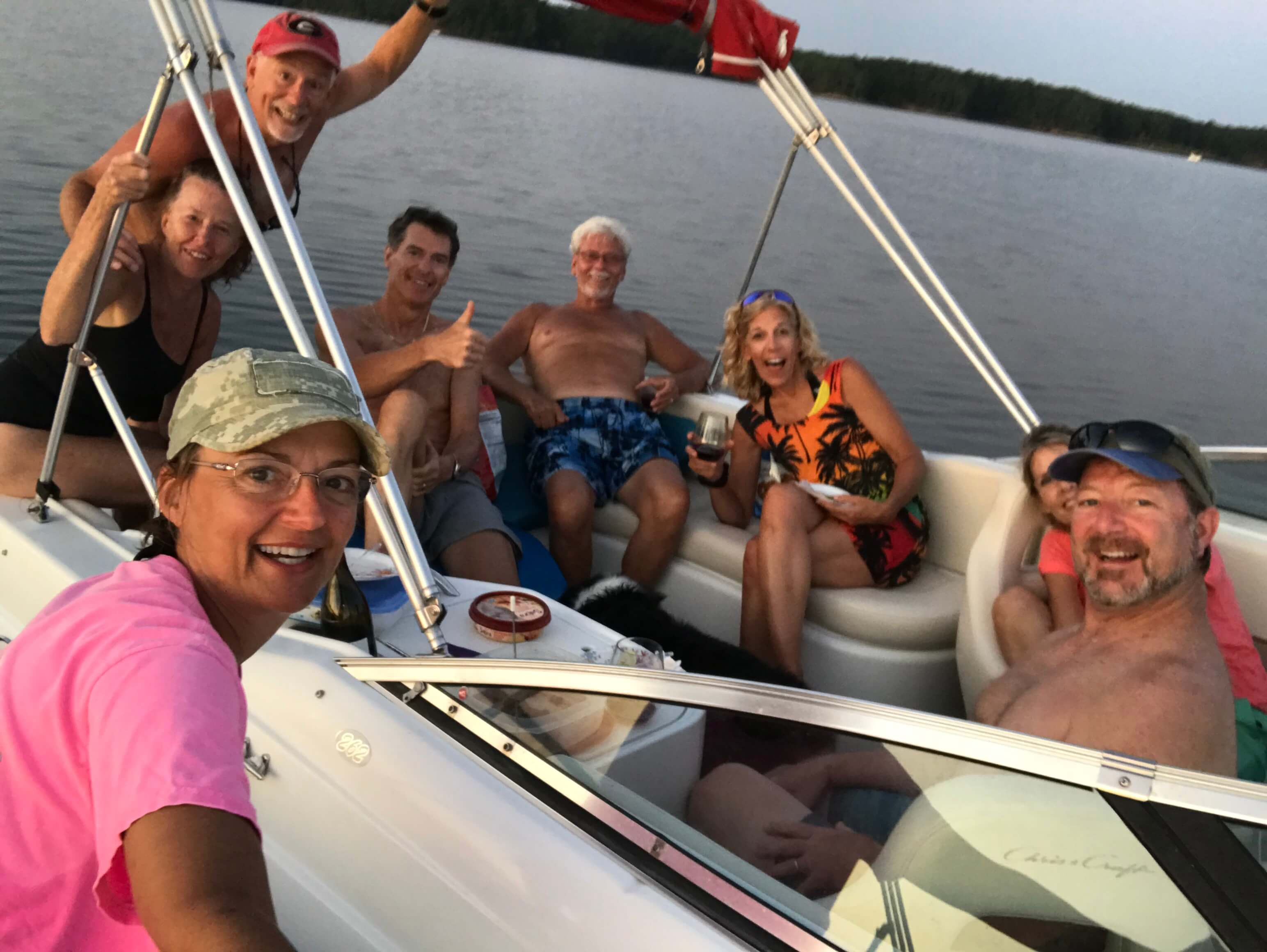 Friends enjoying a sunset cruise at sunset on Lake Thurmond.