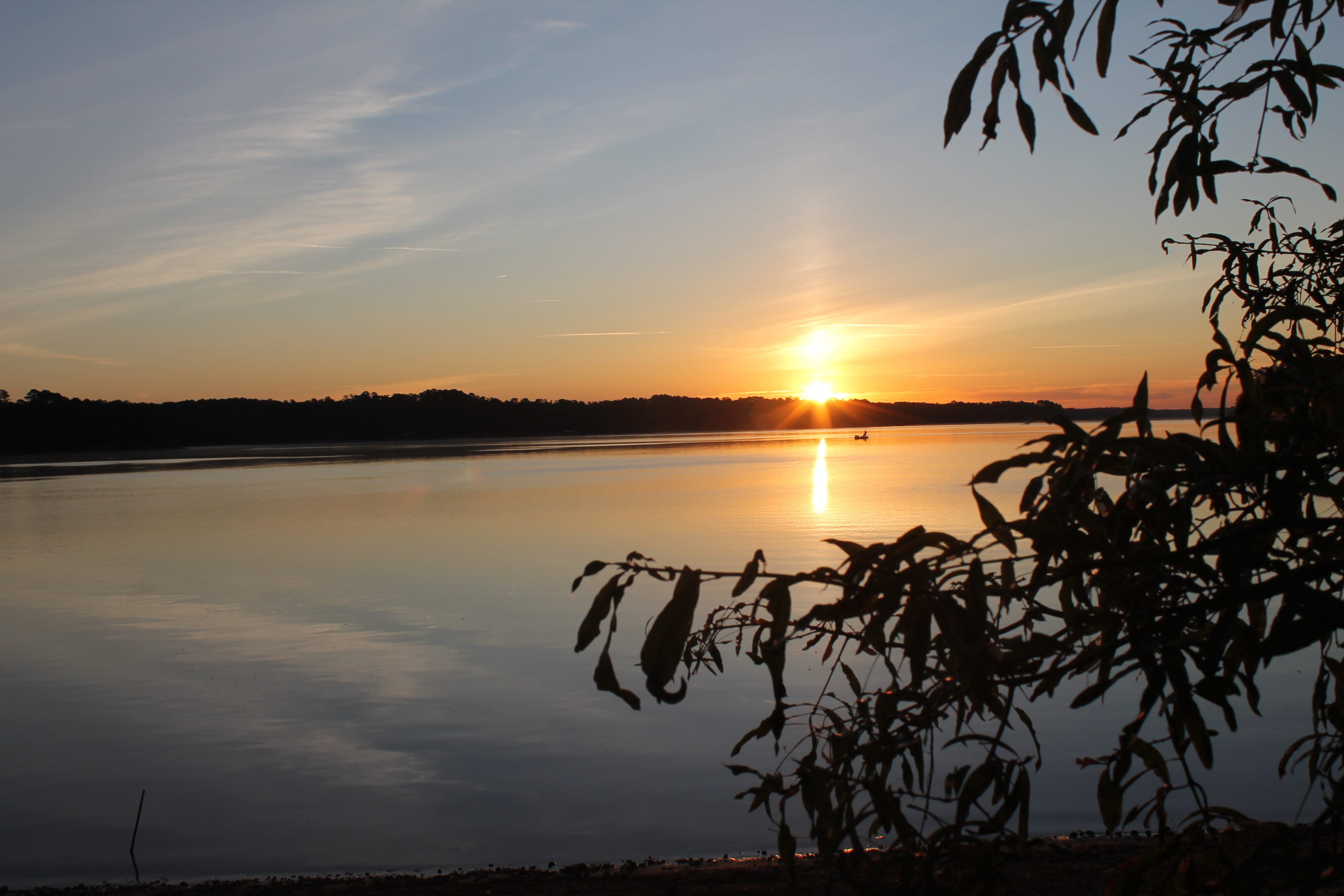 Resident enjoying morning coffe whiule looking over the lake at sunrise on Lake Thurmond at Savannah Lakes Village.