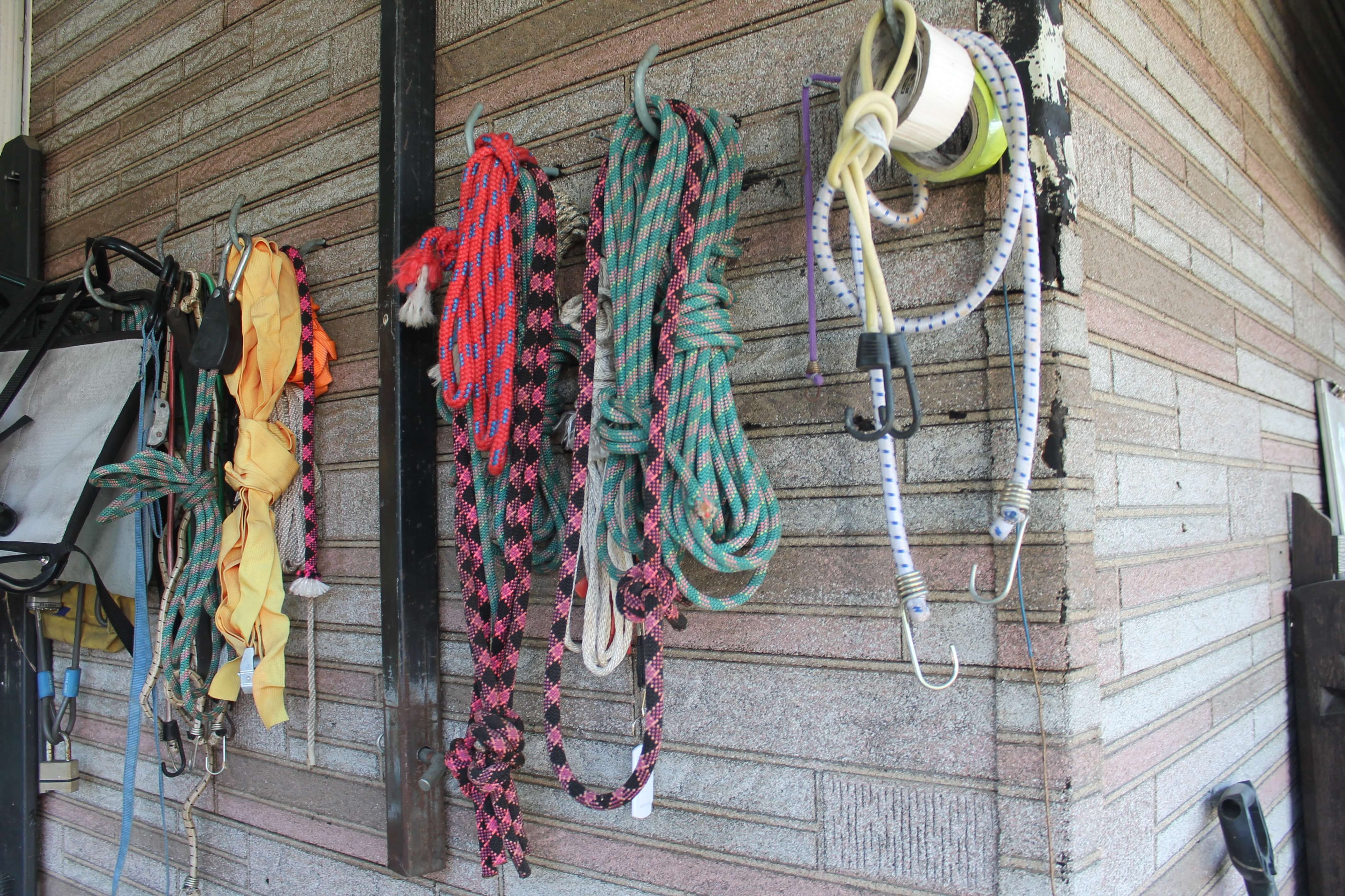 Kayak supplies stored under a covered carport