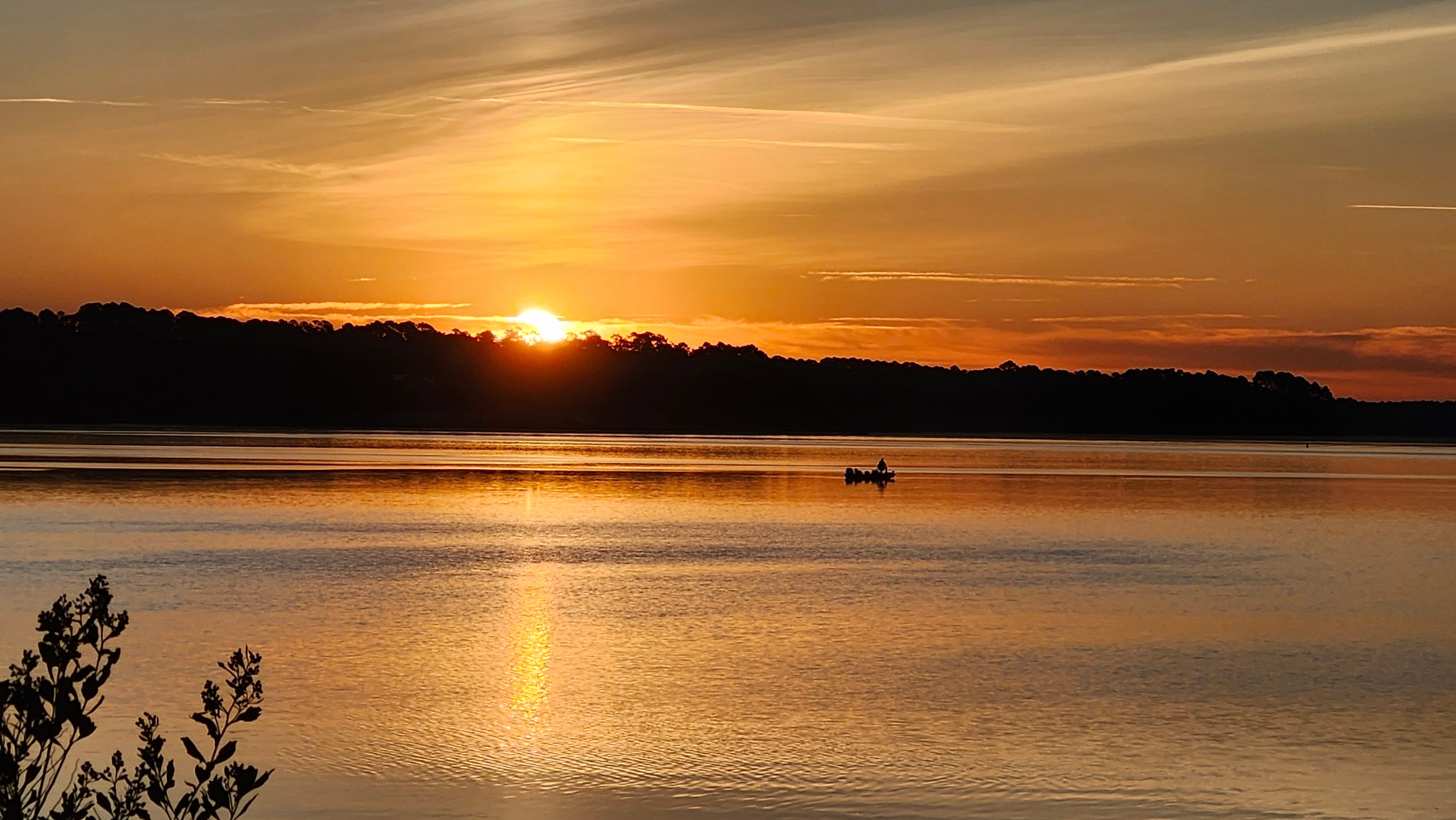 winter-sunrise-over-lake-thurmond-with-fisherman