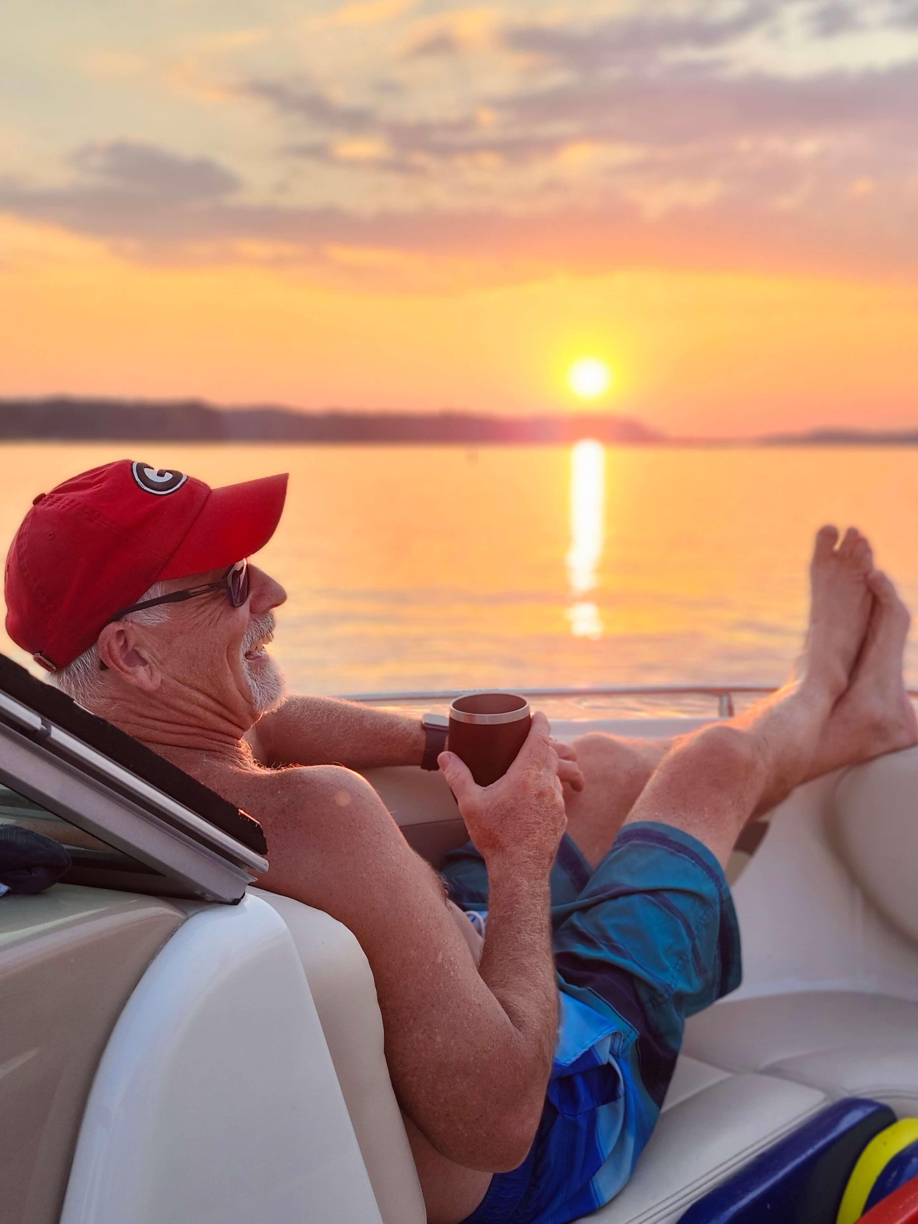 Couple enjoying a quiet pontoon boat ride on uncrowded Lake Thurmond