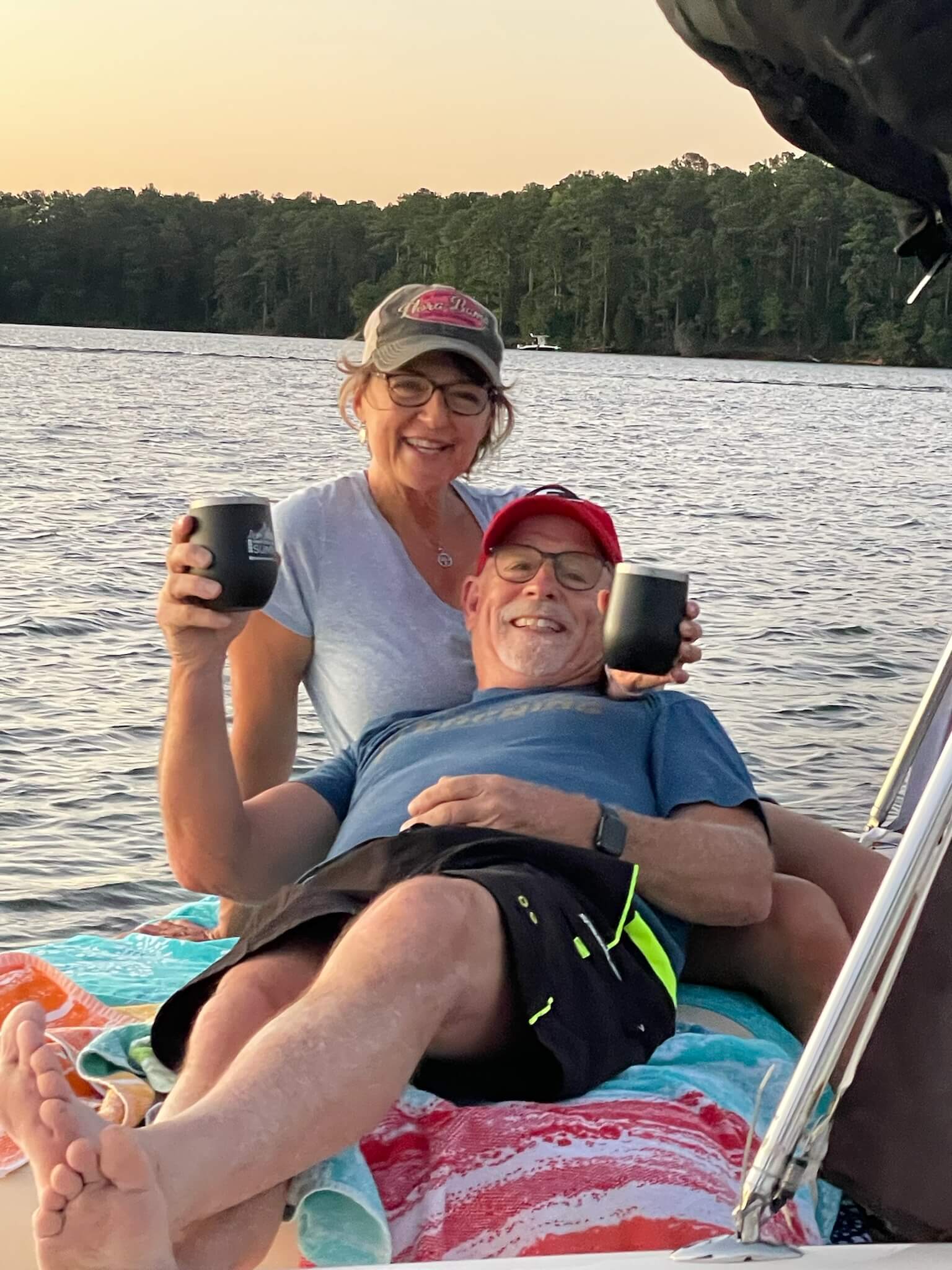 Tom and Karen Greene on their boat near Savannah Lakes Village