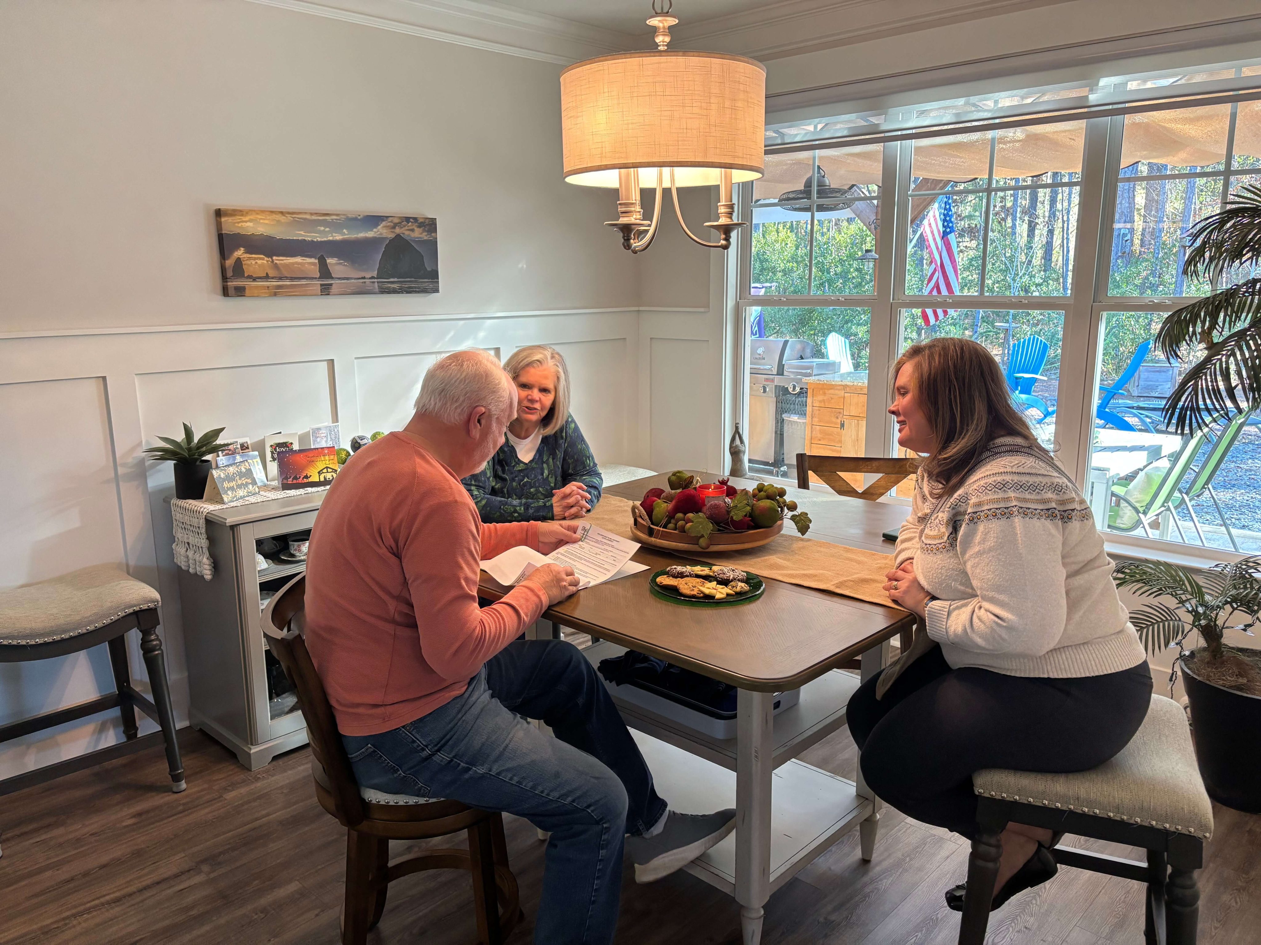 Local Savannah Lakes Village real estate agent advising sellers at home