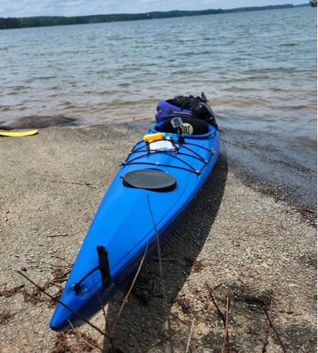 Kayak on a quiet shoreline at Lake Thurmond ready for a morning paddle