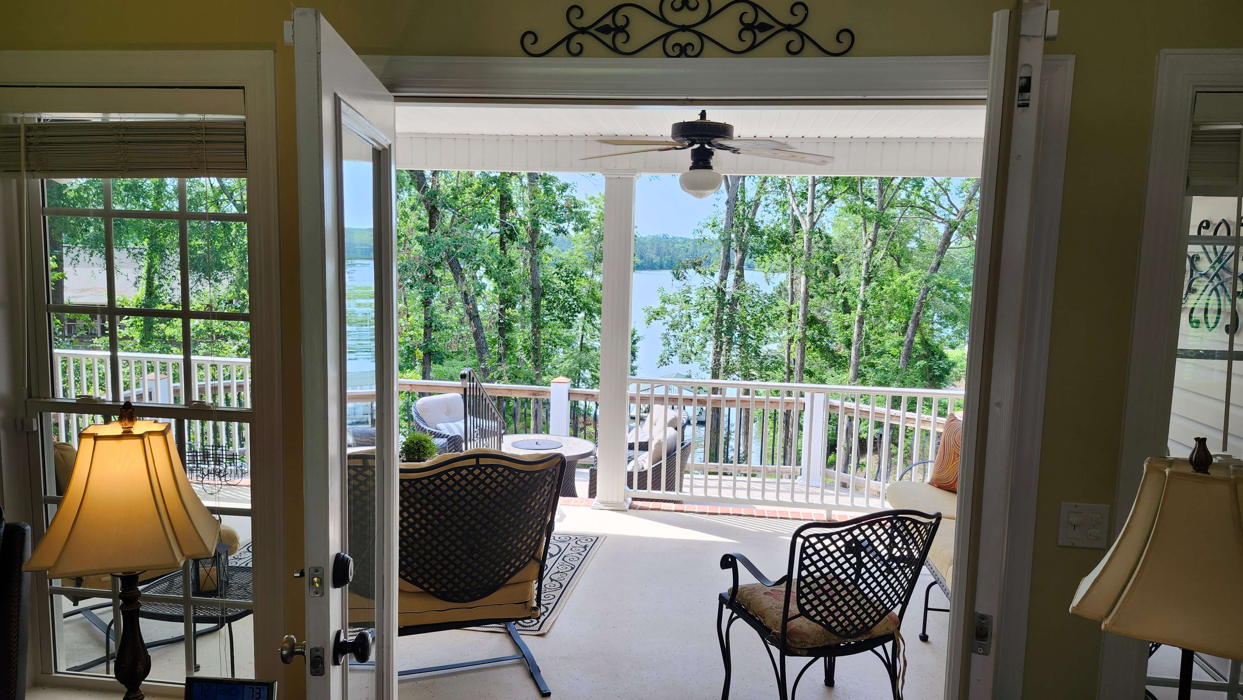 Lake Thurmond view from a tidy deck in winter light, showing calm water and a ready-to-show home setting