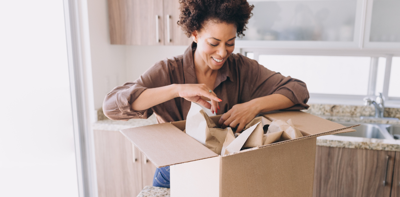 Moving In Woman Packing Boxes