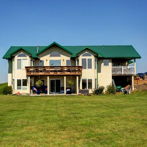 Just Listed: Luxury Living Meets Prairie Serenity at 642243 72 Street E