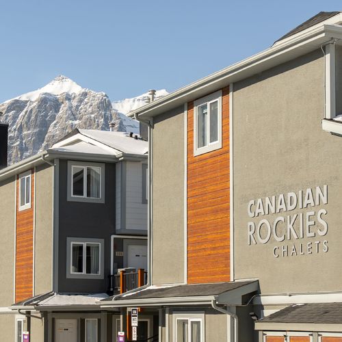 Just Listed in Canmore: Top Floor Mountain Retreat with Breath-taking Views