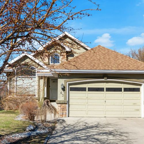 Just Listed in McKenzie Lake: Bright Bungalow Living with Walkout Basement & Private Backyard Retreat